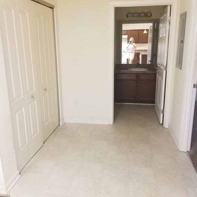 Open area with W/D on left, BR on right, bath ahead - 604 Hampton Rd