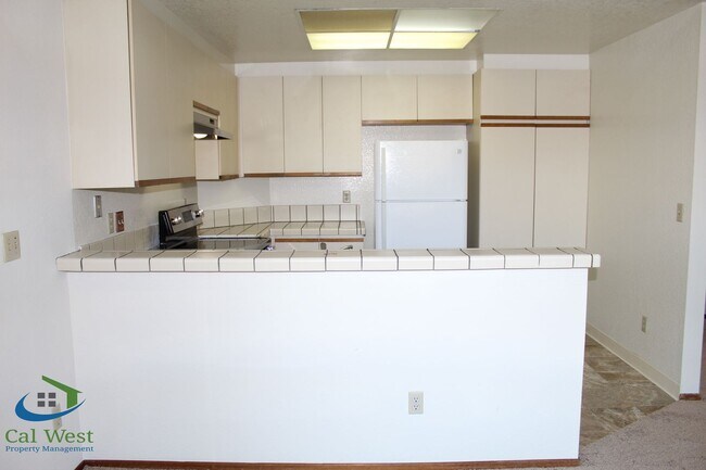 Building Photo - $2,895 - Upstairs 2 Bedroom/1 Bath Condo