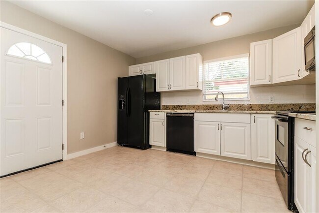 Building Photo - 9537 Groveland St