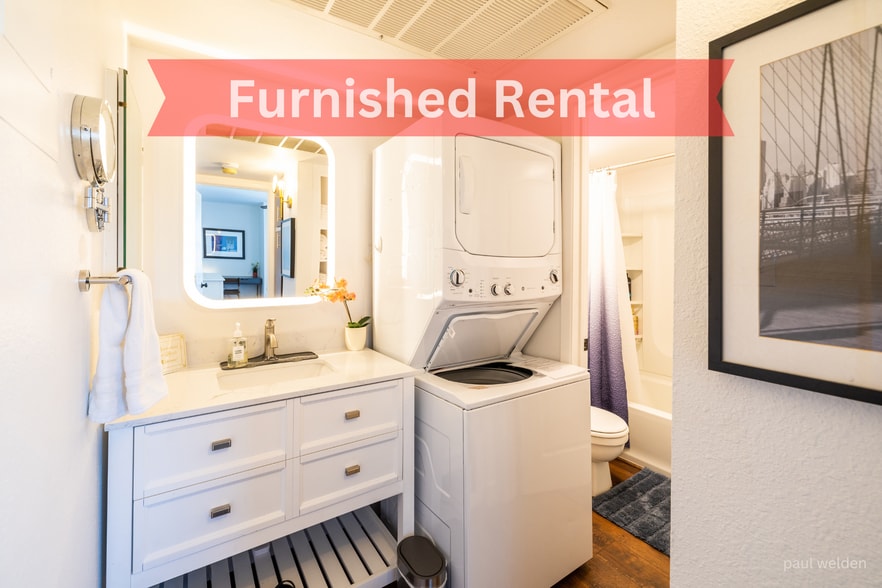 Gorgeous vanity with backlit mirror and large washer/dryer - 1111 E University Dr