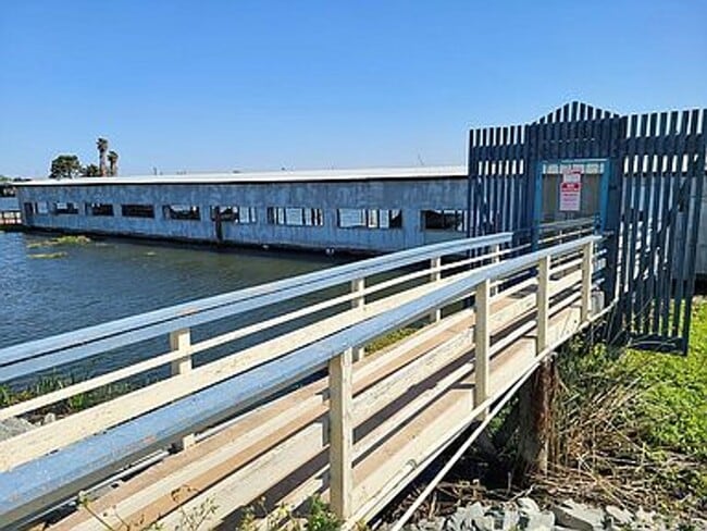 Building Photo - Fabulous Waterfront Condo with Private Boa...