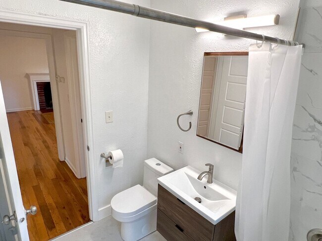 Building Photo - Newly Renovated Single-Family home located...
