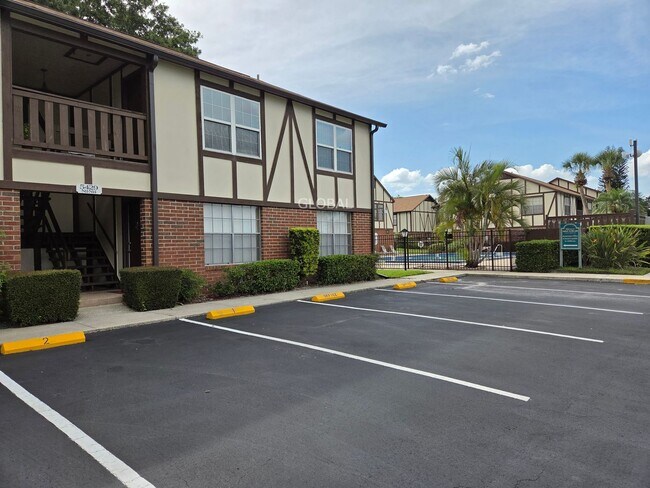 Building Photo - Lakefront First-Floor Condo in Camelot by ...
