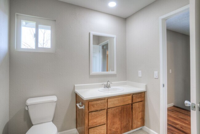 Building Photo - Greenwood Estates has an Excellent 2 Bedroom, 1.5 Bath Townhouse with a Backyard and Garage!