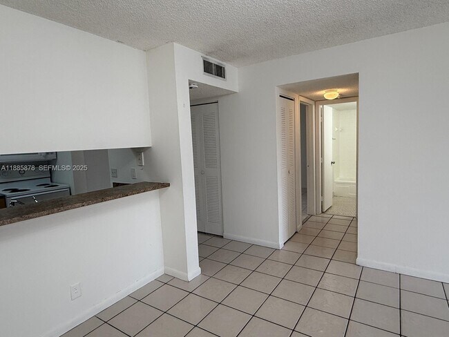 Building Photo - 8550 N Sherman Cir