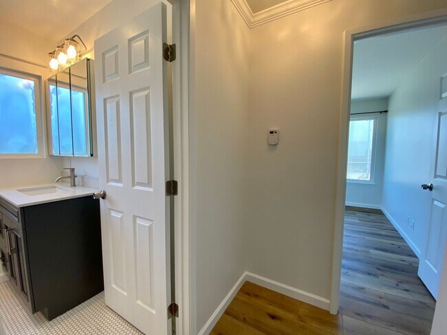 Building Photo - Remodeled 3BR, 2BA with Orchard, Garage & ...