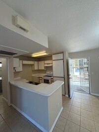 Building Photo - Front Gated 1 Bedroom Condo with AC, W/D, ...