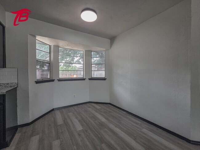 Building Photo - Charming 4-Bedroom Home with Spacious Yard