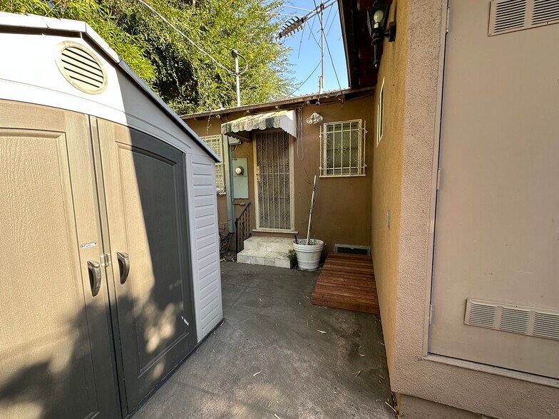Back area Storage shed and Back door - 10807 Huston St