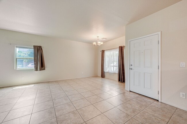 Building Photo - Adorable three bedroom in incredible SW location! Solar panels!
