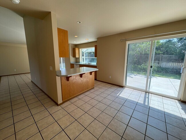 Building Photo - BONUS RENT SPECIAL! Backyard Oasis: 3 Bedroom 2 Bath House Available!