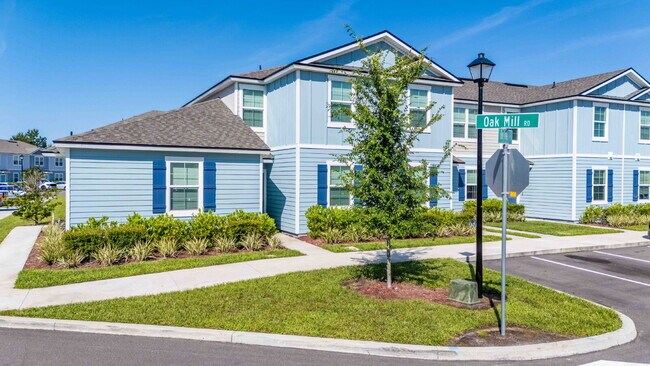 Building Photo - Oakleaf Plantation 3-Bedroom Townhouse in Towering Oaks – Spacious 1450 Sq Ft Living with 2 Full ...