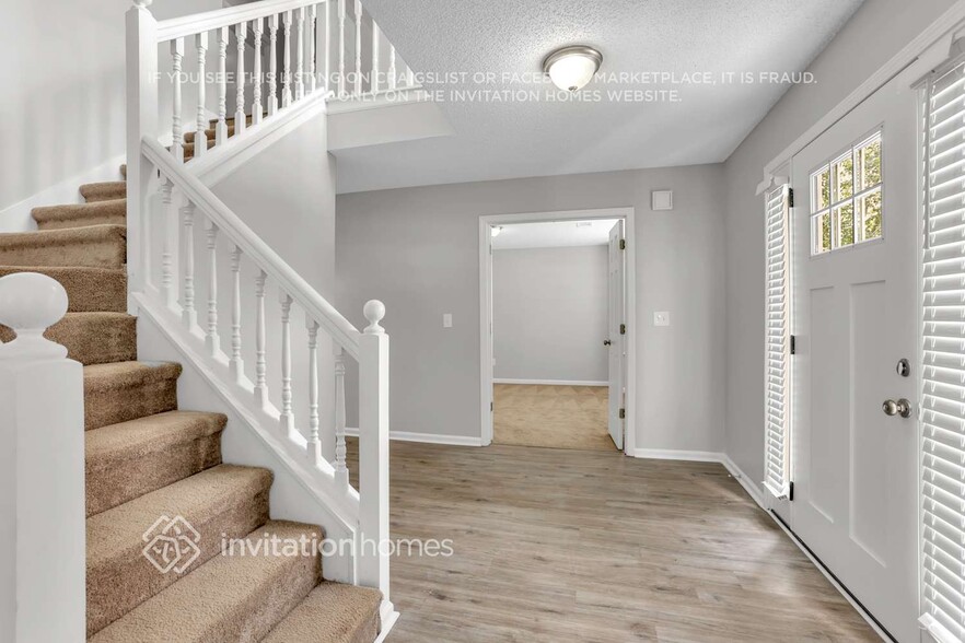 Building Photo - 5614 Carriage Walk Way