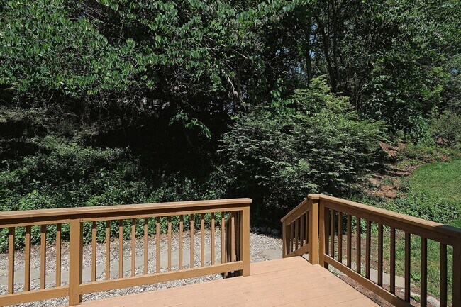 Building Photo - End-Unit Stonehenge Townhome With Loft & Private Deck