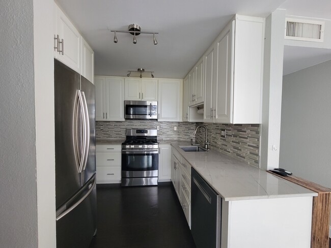 Impeccable Kitchen with stone counter top. - 13120 SW 92nd Ave