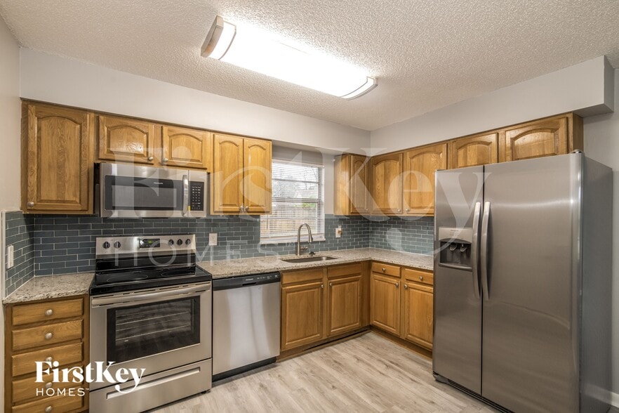 Building Photo - 8704 Country Creek Blvd