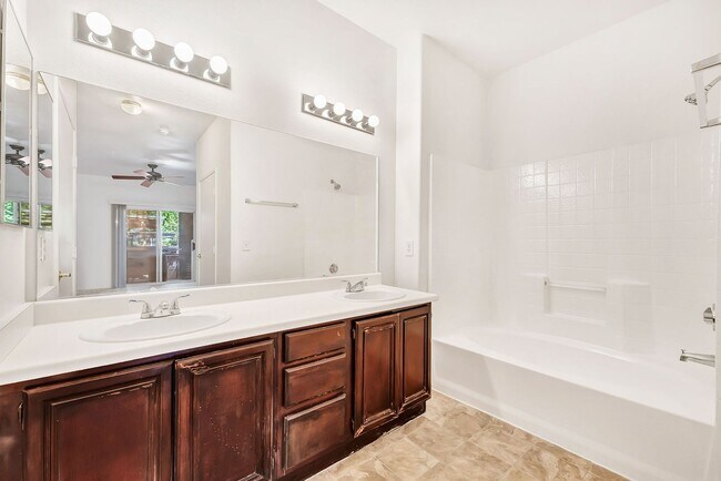 Building Photo - Spacious single-level, first-floor unit featuring 3 bedrooms and 2 bathrooms.