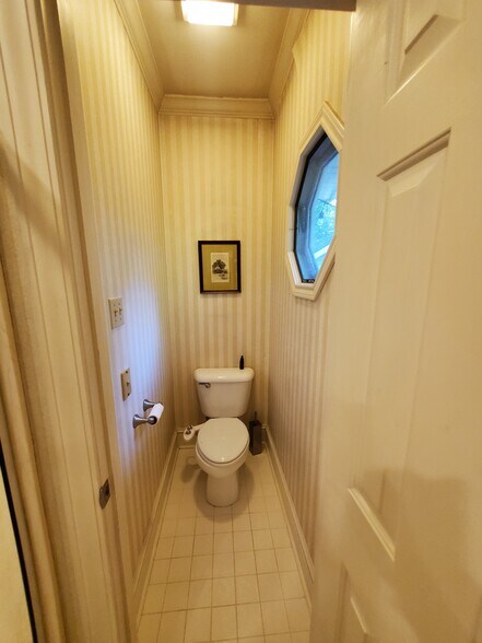 Master Toilet - 411 N Monroe St