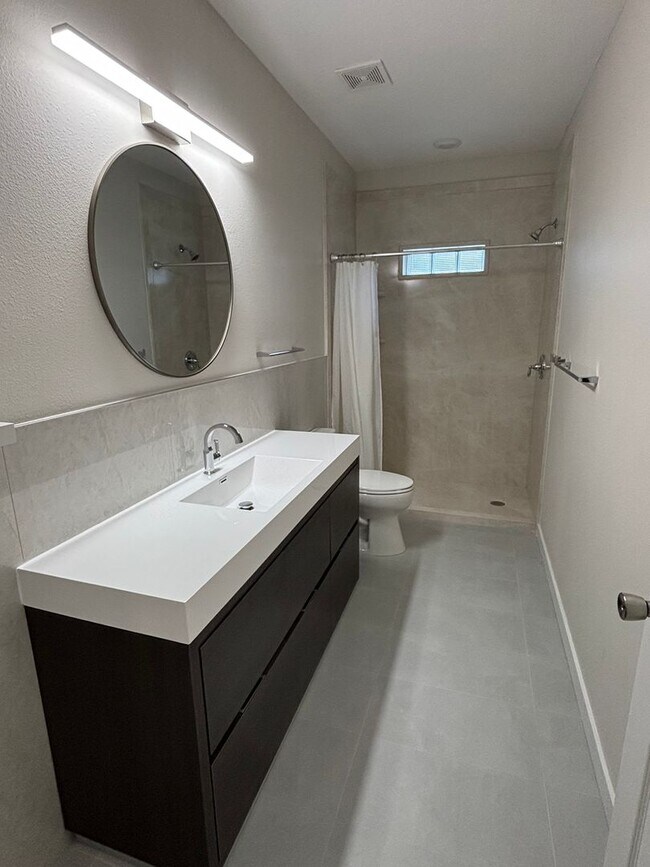 Building Photo - A MUST SEE THREE BEDROOM DUPLEX