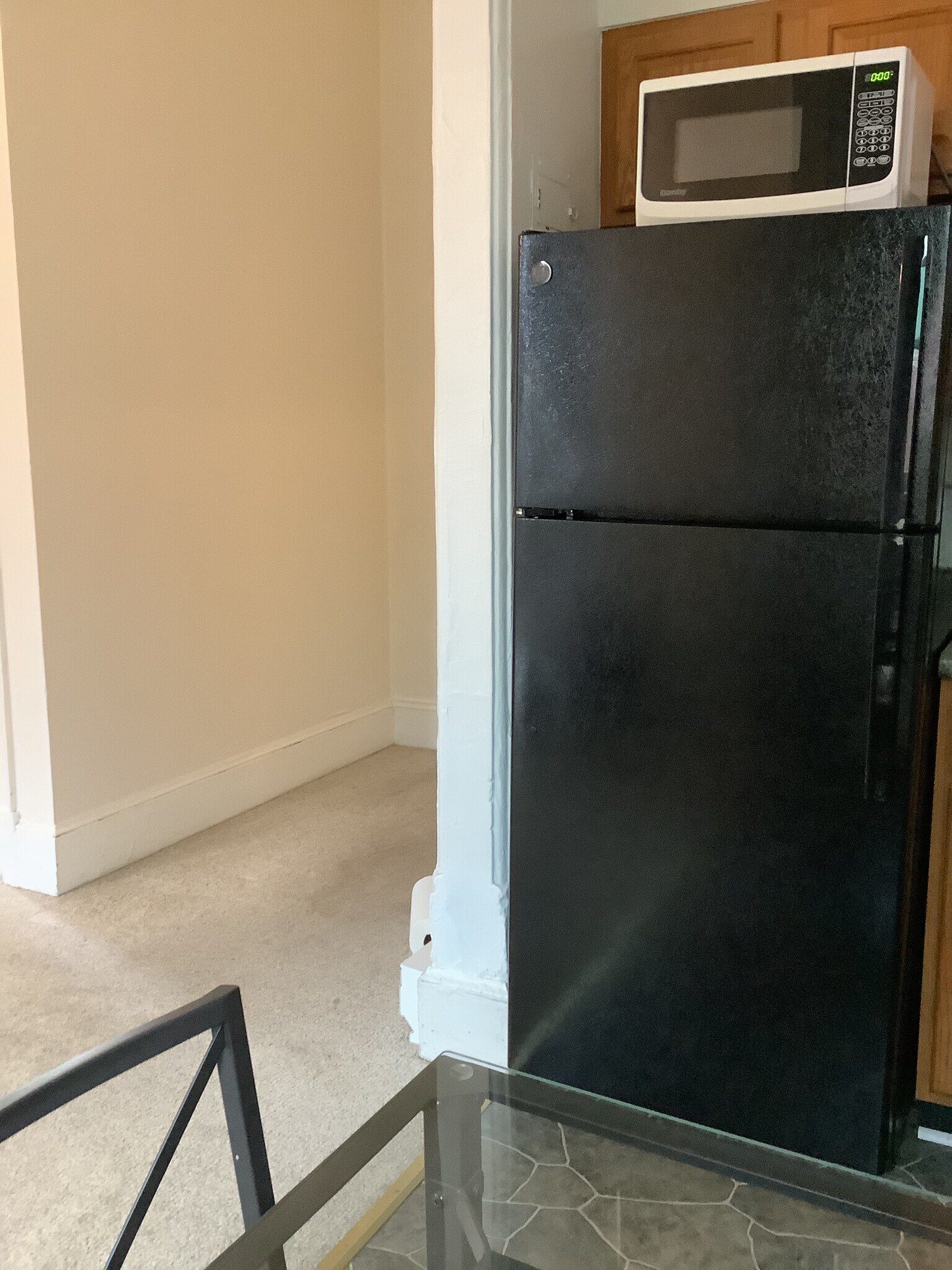 Entrance and refrigerator - 943 M St NW