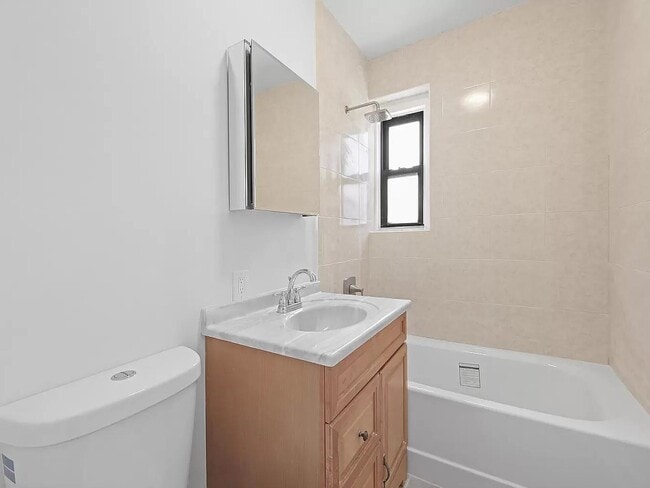 Building Photo - 44-14 Newtown Rd