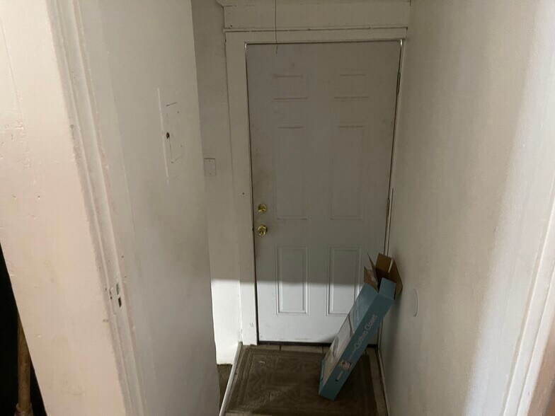 Backdoor lead to basement - 6542 Whitney Ave