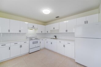 Building Photo - 6320 NW 1st Pl