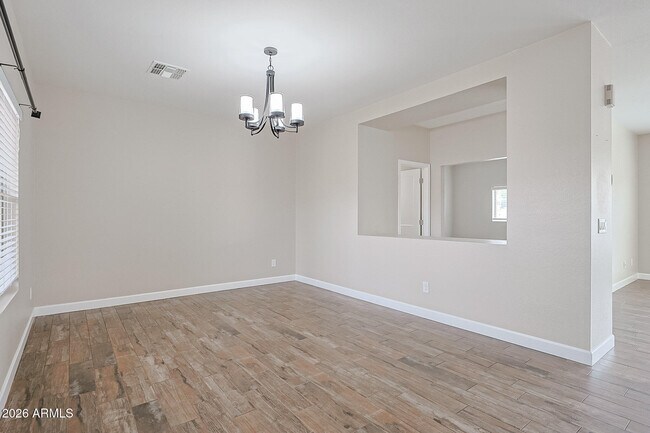 Building Photo - 15569 W Gelding Dr