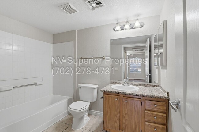 Building Photo - SW!! First floor unit with Balcony!! Gated!! Clubhouse!!  Community pool!! Spa!! Exercise Room!! ...