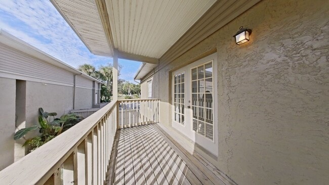 Building Photo - Bright Pool-View Condo with Private Balcony & Open Living Spaces