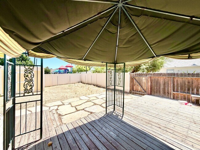 Building Photo - Charming 3 Bedroom Home with Included Landscaping, Spacious Backyard & Carport