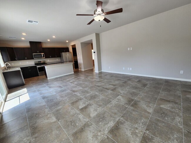 Building Photo - A Fairly New Home with 5 Bedrooms in a gated community