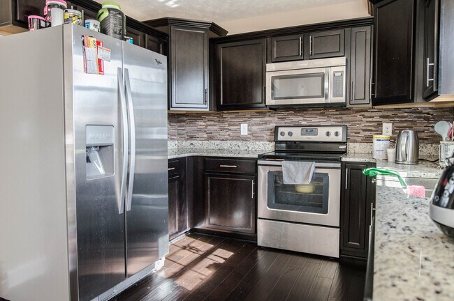 Building Photo - Pet Friendly Four Bedroom with Basement!