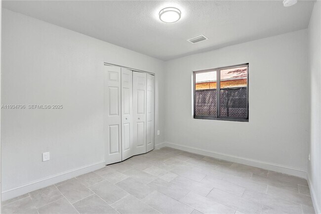 Building Photo - 2420 NW 6th Ct