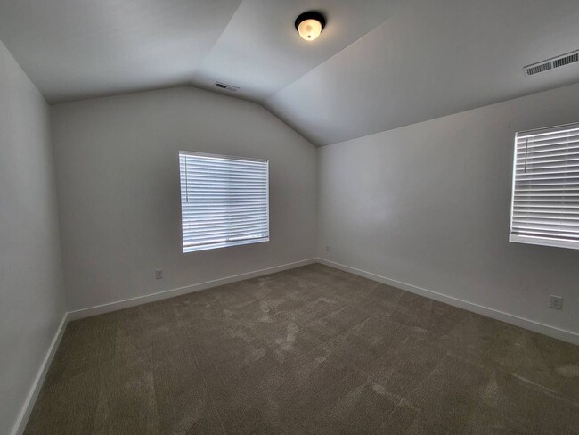 Building Photo - Pet Friendly Gorgeous Row End Townhome w 2 car attached garage!