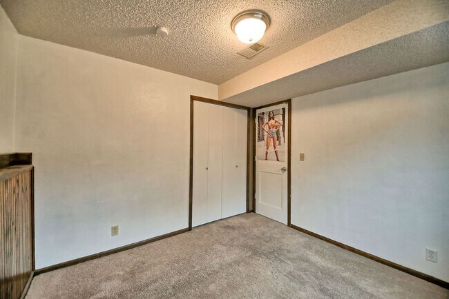 Building Photo - 4-Bedroom Home Near CSU | Fenced Yard & 2-Car Garage