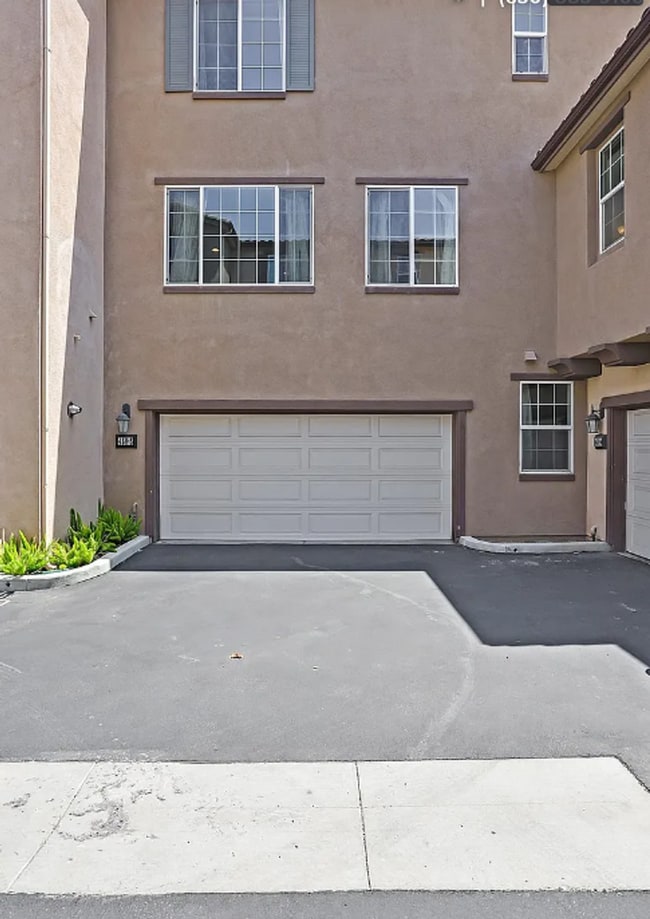 Building Photo - This gorgeous 3-bedroom, 3.5 bath townhome...