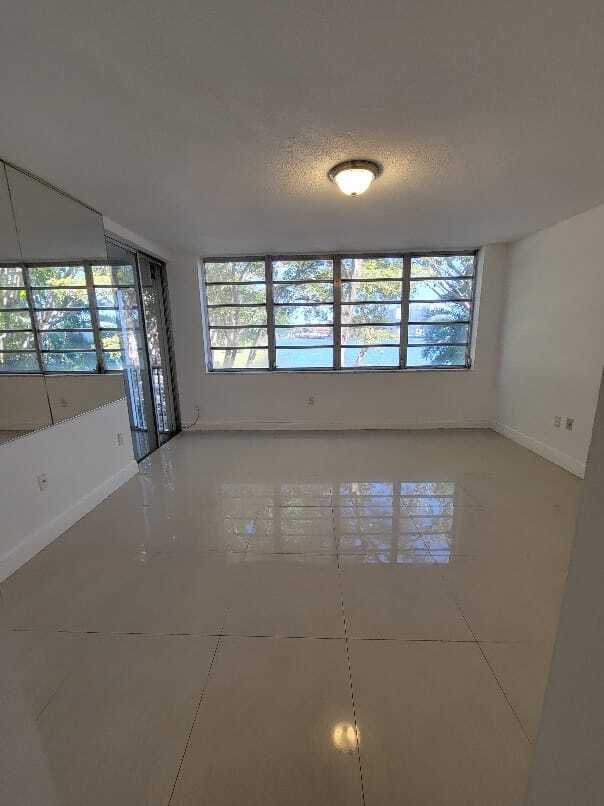 Master bedroom with lake view - 1670 NE 191st St