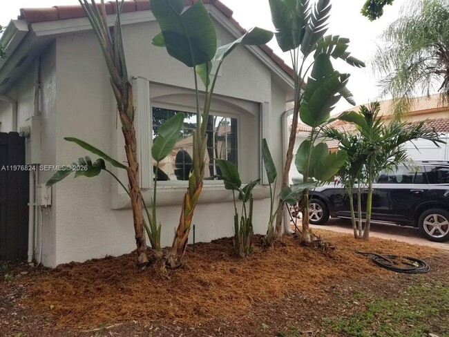 Building Photo - 10889 NW 58th Terrace