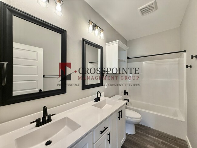 Building Photo - Spacious 4-Bedroom Home with 2.5 Bathrooms, 2-Car Garage & Fenced Yard
