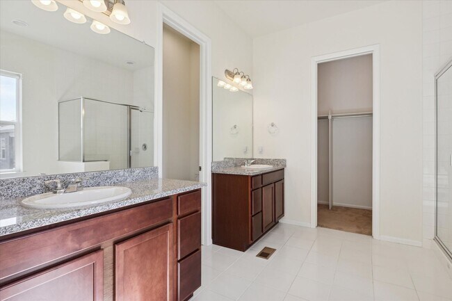 Building Photo - Modern 4-Bed Ranch in Erie with 13-Ft Ceilings, Solar Panels & EV Charger