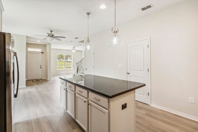 Building Photo - Beautiful 4/2.5 Townhome for Rent in Harmo...