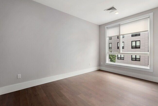 Building Photo - Jamaica Plain spacious studio w/ central a...