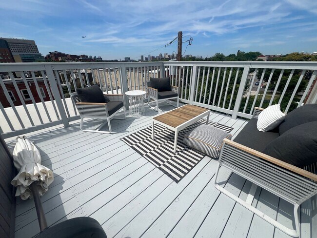 Building Photo - East District 3 BR/3.5 BA End Row Home w-Private Parking