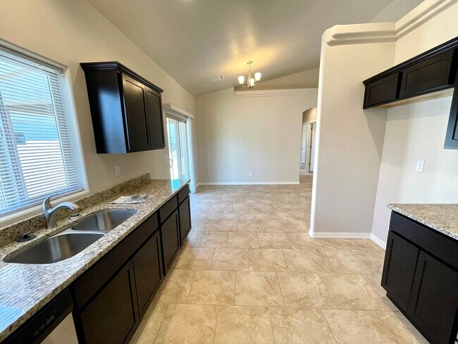 Building Photo - Centrally Located 3BR Home Near Airway Ave | Granite Kitchen, 2-Car Garage & Fenced Yard!