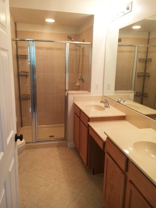 Building Photo - 3 Bedroom 2 Bath corner unit with wrap around balcony in Elevator Building in East Village of Cel...