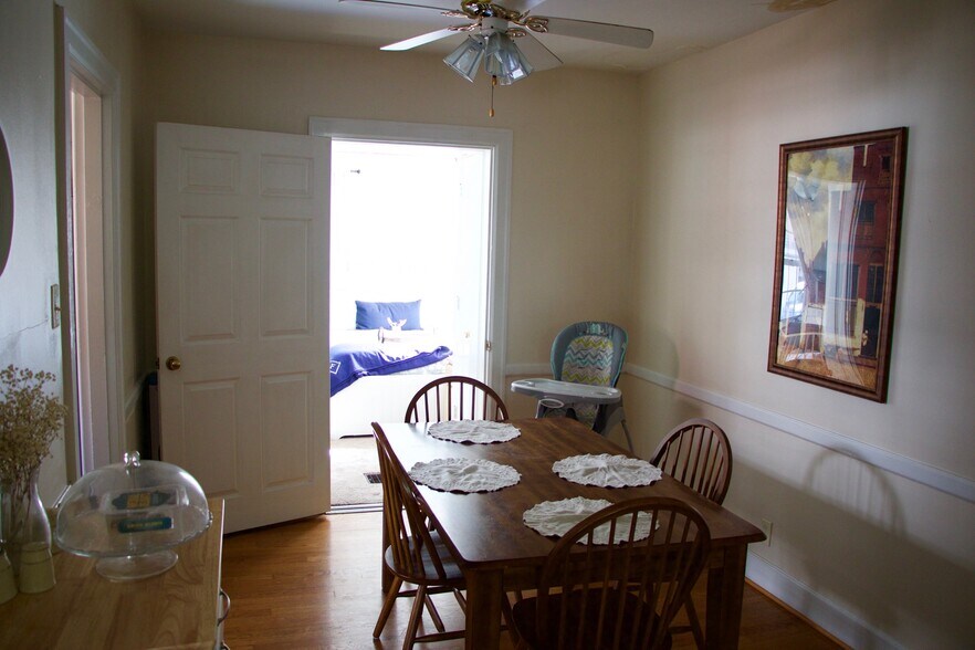Dining room (downstairs bedroom through doorway, kitchen to the left, basement access to the right) - 128 Barberry Lane
