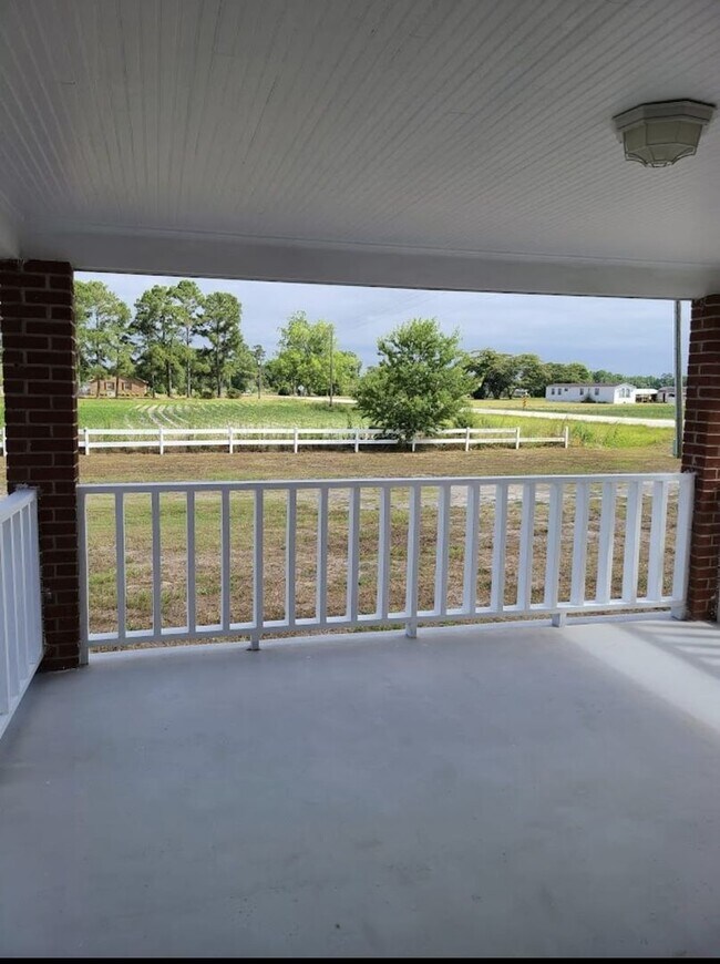 Building Photo - Charming 4-Bedroom Home for Rent – Peaceful & Nature-Filled Setting