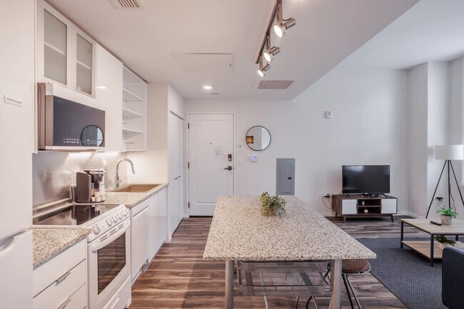 Building Photo - 9-JAN-JAN E 4th St