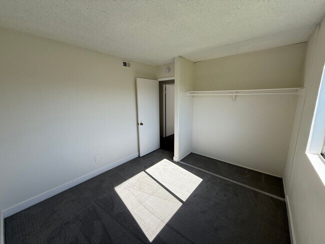 Building Photo - 4 Bedroom, 2 Bath Home with Large Yard + Two Car Garage